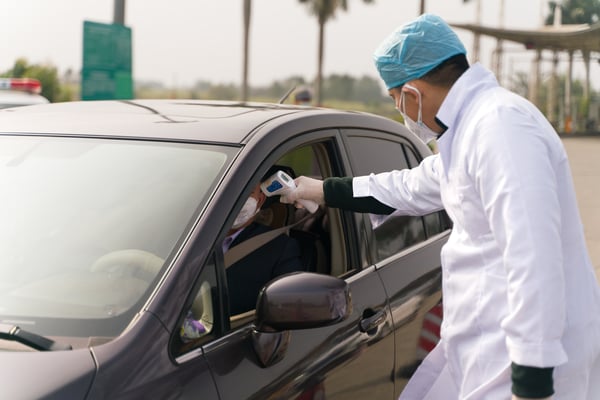 Doctors Checking Temperature at freeway tolls in China due to Coronavirus